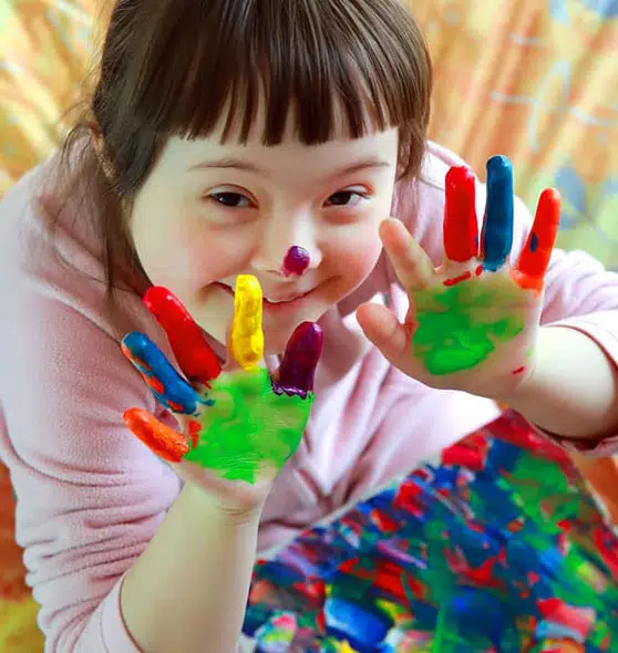 Child Finger Painting — Supported Independent Living in Bundaberg, QLD